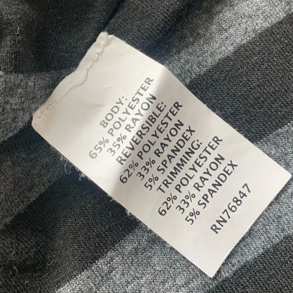 Apropos knit vest, black, gray geometrical jersey print adds warmth and layers M